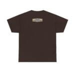 Back view of a dark brown T-shirt with a small beige label centered near the neckline that reads 'Designed By The Simple Design Mindset'.