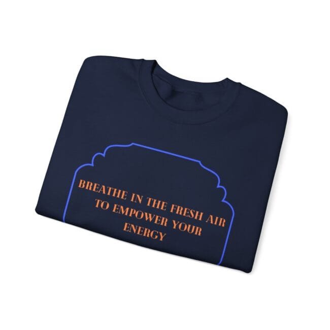 Navy t-shirt with an orange motivational message: 'BREATHE IN THE FRESH AIR TO EMPOWER YOUR ENERGY' inside a blue arch outline.