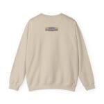 Beige crewneck sweatshirt shown from the back with a small tan label on the upper back reading 'Designed By The Simple Design Mindset'.