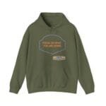 Olive green hoodie with a purple-bordered emblem and the orange text: 'FOCUS ON WHAT YOU ARE DOING' on the chest.