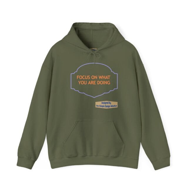 Olive green hoodie with a purple-bordered emblem and the orange text: 'FOCUS ON WHAT YOU ARE DOING' on the chest.