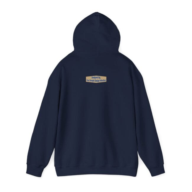 Back view of a navy hoodie with a small tan label centered on the upper back reading 'Designed By The Simple Design Mindset'.