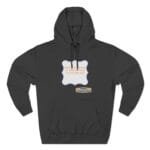 Dark gray hoodie featuring a white, blue-outlined badge with an orange quote about continuous learning and a small beige designer label underneath.