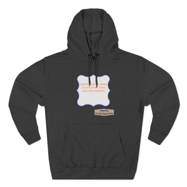Dark gray hoodie featuring a white, blue-outlined badge with an orange quote about continuous learning and a small beige designer label underneath.