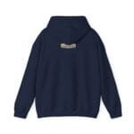 Navy hoodie shown from the back with a small beige label on the upper back reading, “The Simple Design Mindset.”