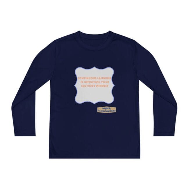 Navy long-sleeve shirt with a pale blue decorative frame on the chest, containing orange text about continuous learning and a small designer label below.