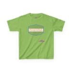 Green T-shirt with blue ornate frame and orange text: 'BREATHE IN THE FRESH AIR TO EMPOWER YOUR ENERGY' and a small designer credit nearby