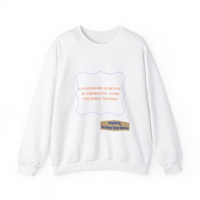 White sweatshirt with an orange quote 'Continuous Learning Is Improving Your Cultures Mindset' inside a blue decorative frame, plus a small designer label reading 'Designed By The Simple Design MindSet'.