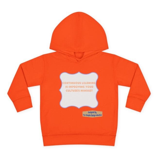 Orange hoodie with a white badge-shaped print on the chest reading, 'Continuous learning is improving your culture's mindset', plus a small designer label underneath.