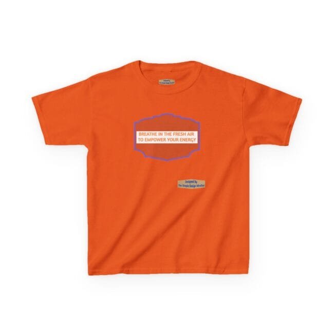 Orange T-shirt with a blue outlined badge on the chest reading: “Breathe in the fresh air to empower your energy.” A small designer tag is visible below.