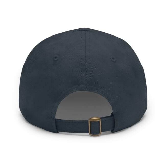 Back view of a navy baseball cap with an adjustable strap and brass buckle visible at the rear.