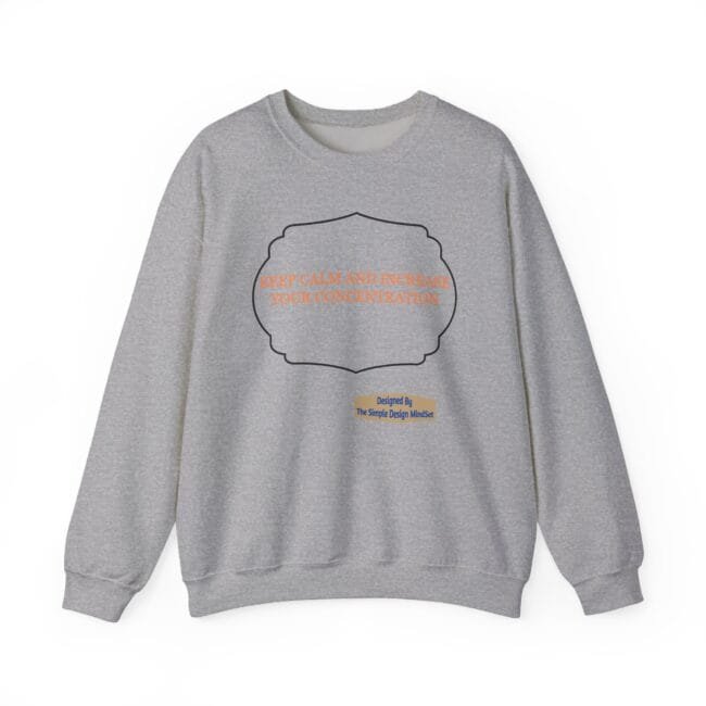 Grey sweatshirt featuring orange text 'KEEP CALM AND INCREASE YOUR CONCENTRATION' inside a black decorative frame, with a small designer label at the bottom.