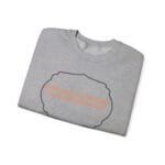 Folded light gray T-shirt with an orange slogan: "KEEP CALM AND INCREASE YOUR CONCENTRATION" inside a black-cloud outline.