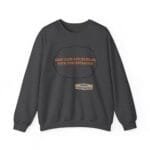 Dark gray sweatshirt with orange text reading 'KEEP CALM AND INCREASE YOUR CONCENTRATION' inside a decorative frame, plus a small designer label below.