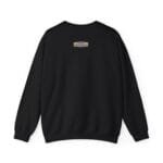 Black crewneck sweatshirt seen from the back with a small beige label on the upper center back.
