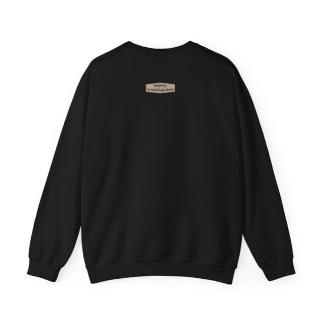 Black crewneck sweatshirt seen from the back with a small beige label on the upper center back.