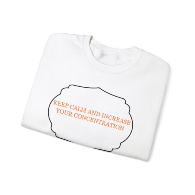 White folded T-shirt with a black cloud outline and orange text reading 'KEEP CALM AND INCREASE YOUR CONCENTRATION'.
