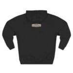 Black hoodie with a small beige patch at the back neck area reading 'Designed By The Simple Design Mindset' (centered label).