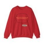 Red sweatshirt featuring a decorative black frame with the phrase 'KEEP CALM AND INCREASE YOUR CONCENTRATION' in orange text, plus a small designer label at the bottom center