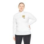 Woman wearing a white quarter-zip fleece top with a small yellow text logo on the left chest, standing against a white background.