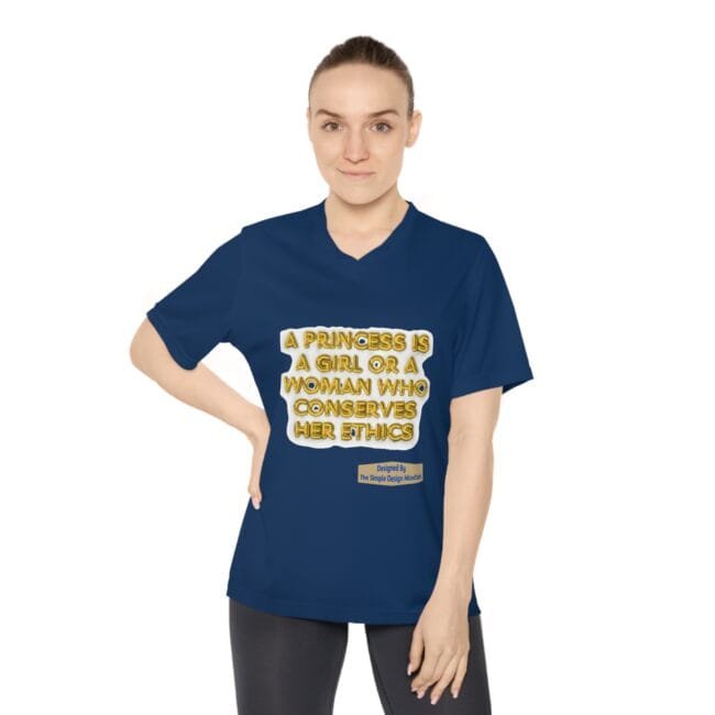 Woman wearing a navy T-shirt showing a gold, bubble-letter quote: 'A princess is a girl or a woman who conserves her ethics' on the chest.