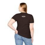 Back view of a person wearing a dark brown t-shirt with a small rectangular label on the upper back, paired with blue jeans.