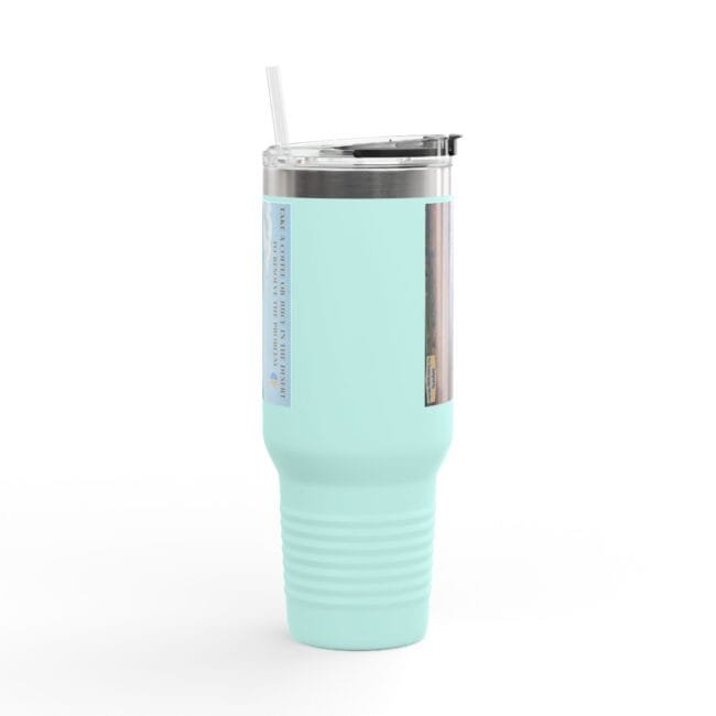 Turquoise stainless steel tumbler with clear lid and straw, featuring vertical labels on the side for a travel mug or coffee cup context.