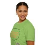 Smiling young woman in a lime-green T-shirt with a speech-bubble graphic reading 'KEEP CALM AND DON'T DISTURB MY HEAD PLEASE!'