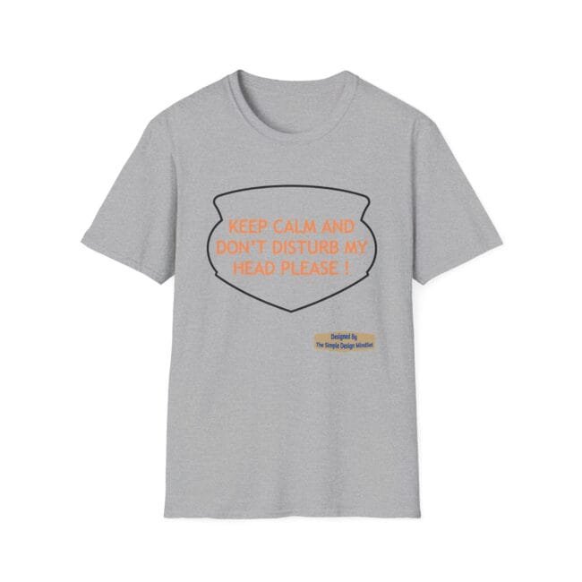 Gray T-shirt featuring an orange slogan inside a black shield: 'KEEP CALM AND DON'T DISTURB MY HEAD PLEASE!'