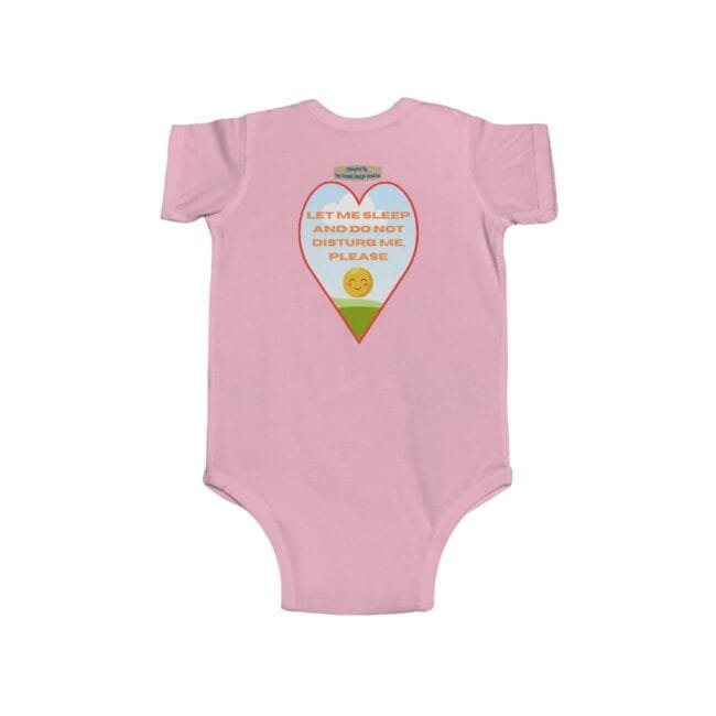 Pink baby onesie featuring a heart-shaped graphic with the text 'Let me sleep and do not disturb me, please' and a small sun emoji in a scenic hill backdrop.