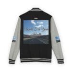 Back of a black-and-gray varsity jacket featuring a large photo patch: a highway under a blue sky with text 'Walk For Your Health' in cursive font.