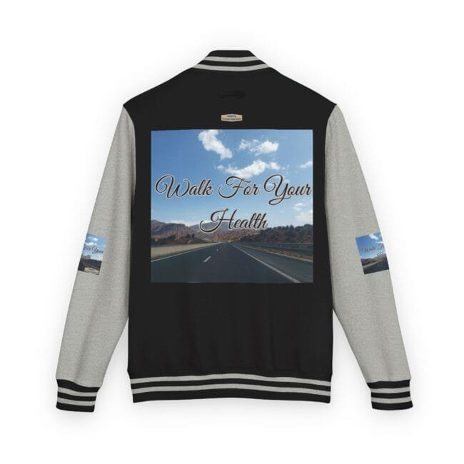 Back of a black-and-gray varsity jacket featuring a large photo patch: a highway under a blue sky with text 'Walk For Your Health' in cursive font.