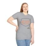 Smiling woman wearing a gray T-shirt with orange text: 'KEEP CALM AND DON'T DISTURB MY HEAD PLEASE!'