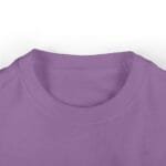 Close-up of a lavender t-shirt neckline and collar, showing soft knit fabric and stitched seam details.