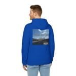 Man in a blue hoodie seen from behind, with a back graphic showing a road and the words 'Walk For Your Health' across a cloudy sky.