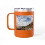 Orange insulated tumbler with a clear lid, featuring a mountain landscape and the caption 'Keep calm and increase your concentration'.