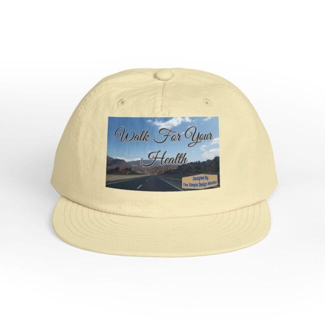 Beige baseball cap with a rectangular patch showing a highway scene and the text 'Walk For Your Health' on the front.