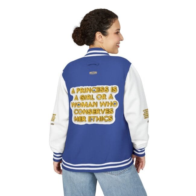 Blue varsity jacket with white sleeves, back displays bold yellow text: “A princess is a girl or a woman who conserves her ethics.”