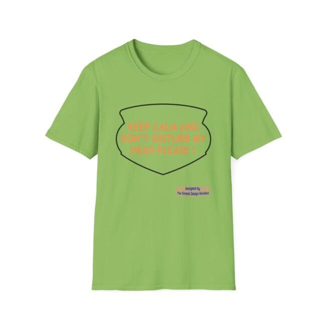 Lime-green T-shirt with a large black shield outline and orange text: ‘KEEP CALM AND DON’T DISTURB MY HEAD PLEASE!’