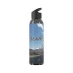 Water bottle with black cap and a blue sky scenic label reading 'Walk' over a road through desert landscape