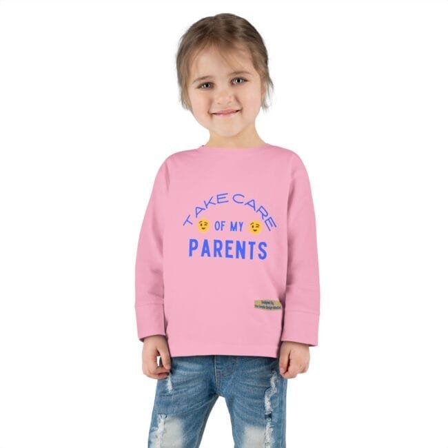 Smiling young girl in a pink sweatshirt with the slogan 'Take care of my parents' in blue text on the front.