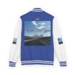 Back view of a blue-and-white varsity jacket with a large photo on the back: a desert highway under a blue sky with the text 'Walk For Your Health'.