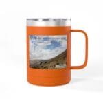 Orange insulated tumbler with a landscape sticker and the quote 'Keep calm and increase your concentration.'