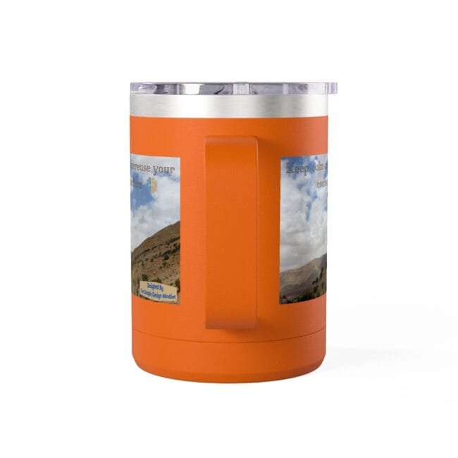 Orange insulated tumbler with a clear lid, featuring a vertical grip and two landscape photo decals on the sides