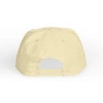 Back view of a beige baseball cap with an plastic adjustable strap and holes.