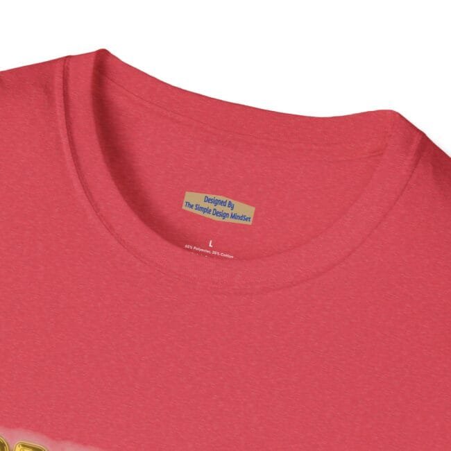 Close-up of a pink heathered T-shirt neckline with an inner tag that reads 'Designed By The Simple Design MindSet'.