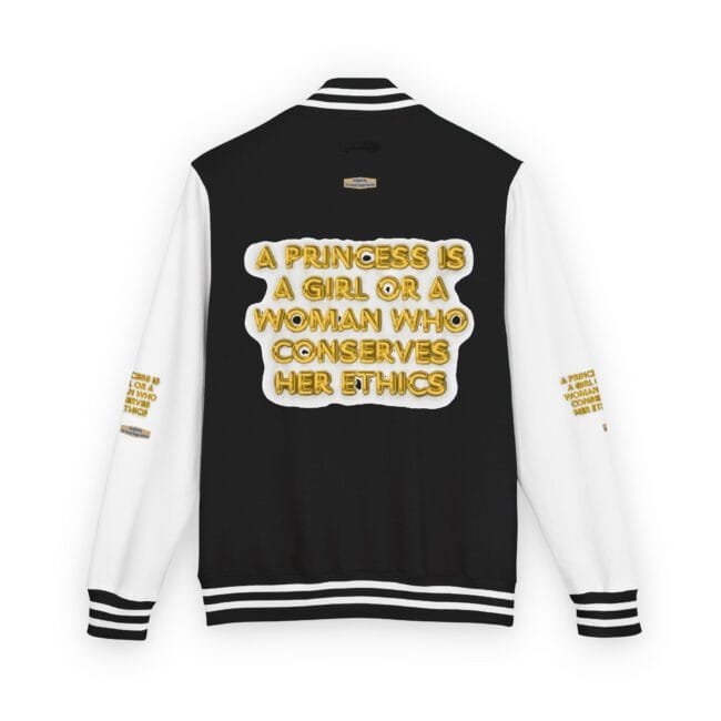 Back view of a black-and-white varsity jacket featuring a large gold-lettered quote on a white patch: 'A PRINCESS IS A GIRL OR A WOMAN WHO CONSERVES HER ETHICS'.