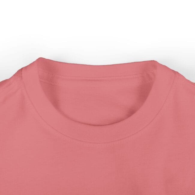 Close-up of a pink crew-neck T-shirt neckline showing the ribbed collar and fabric texture.