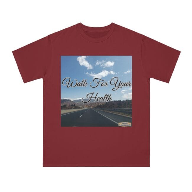 Maroon T-shirt with a photo of an open highway, blue sky and mountains, overlaid with the cursive text “Walk For Your Health.”