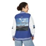 Back view of a blue and white varsity jacket with a large graphic on the back reading 'Walk For Your Health' over a road scene.